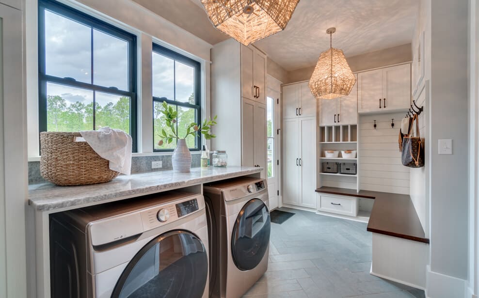 Laundry Room with White Cabinets & Bench